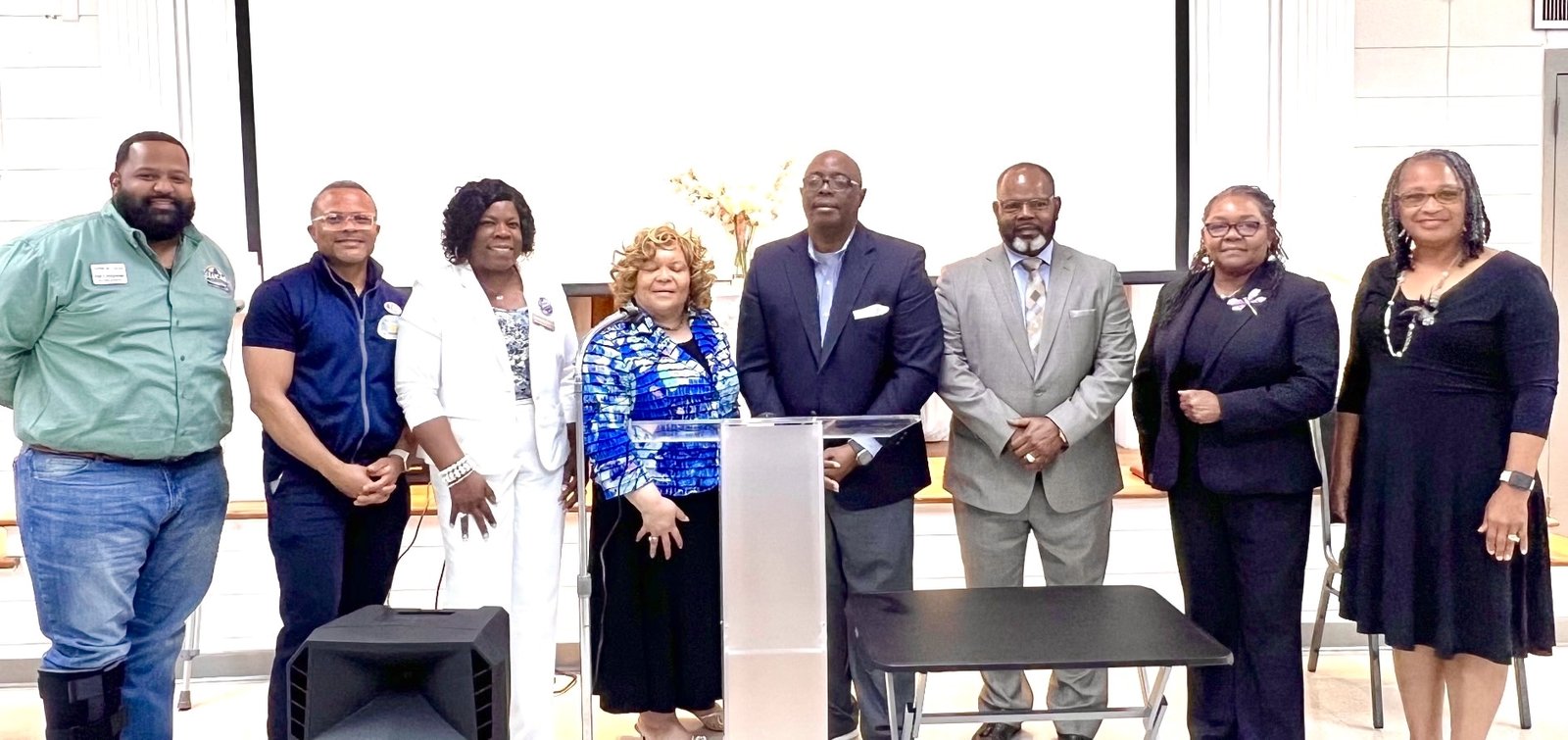 Cynthia Johnson with community leaders at a candidate forum