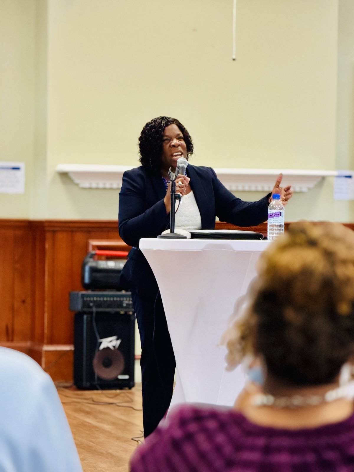 Cynthia Johnson addressing a community forum