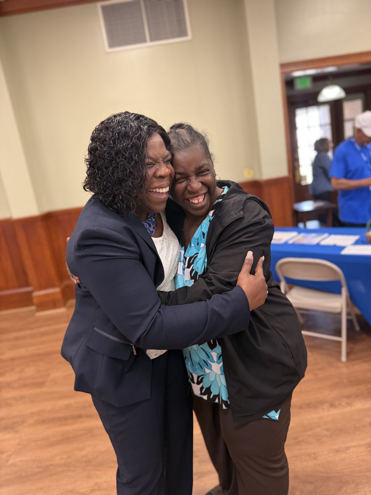 Cynthia Johnson greeting a supporter