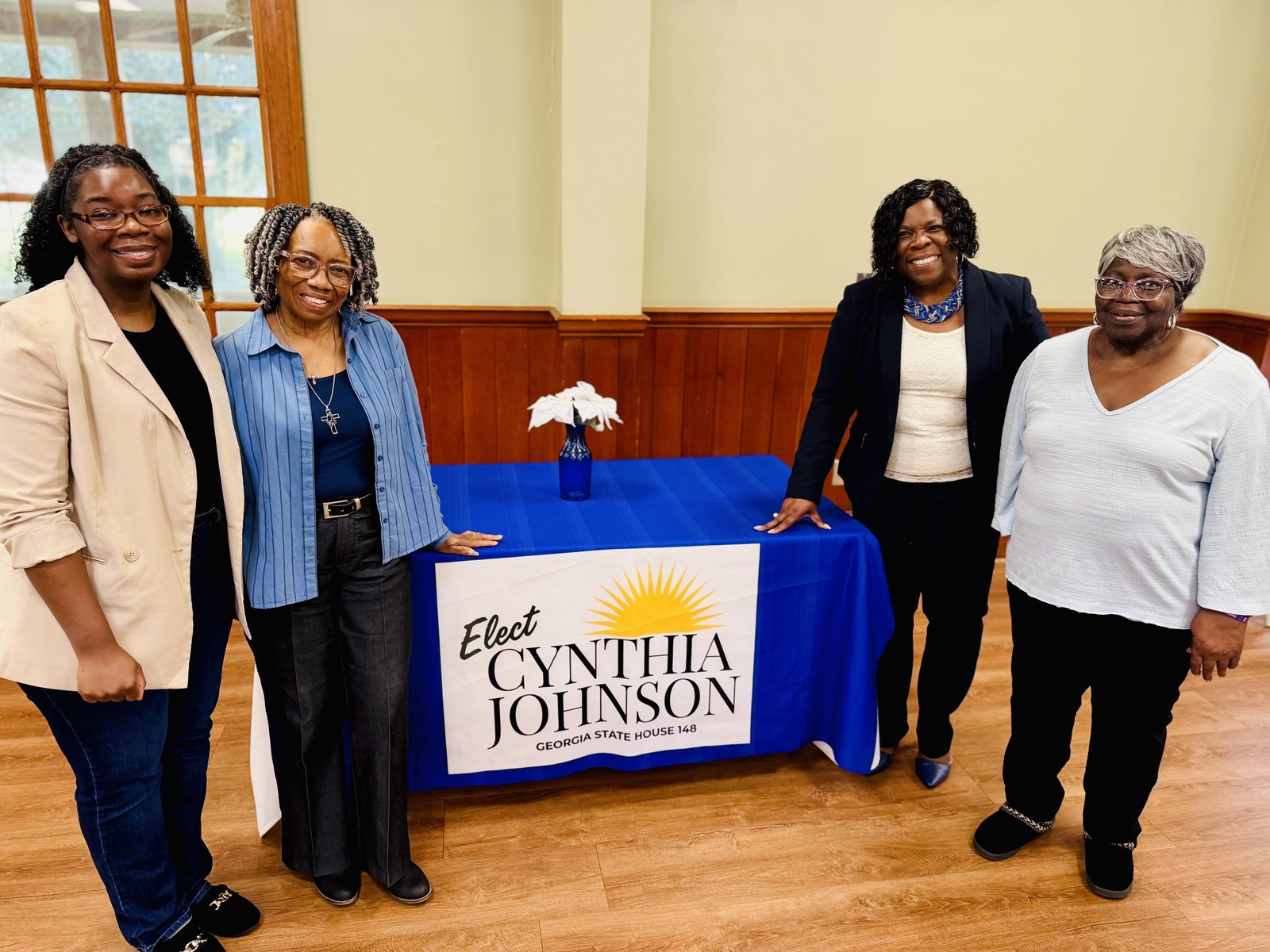 Cynthia Johnson with community leaders at a recognition event