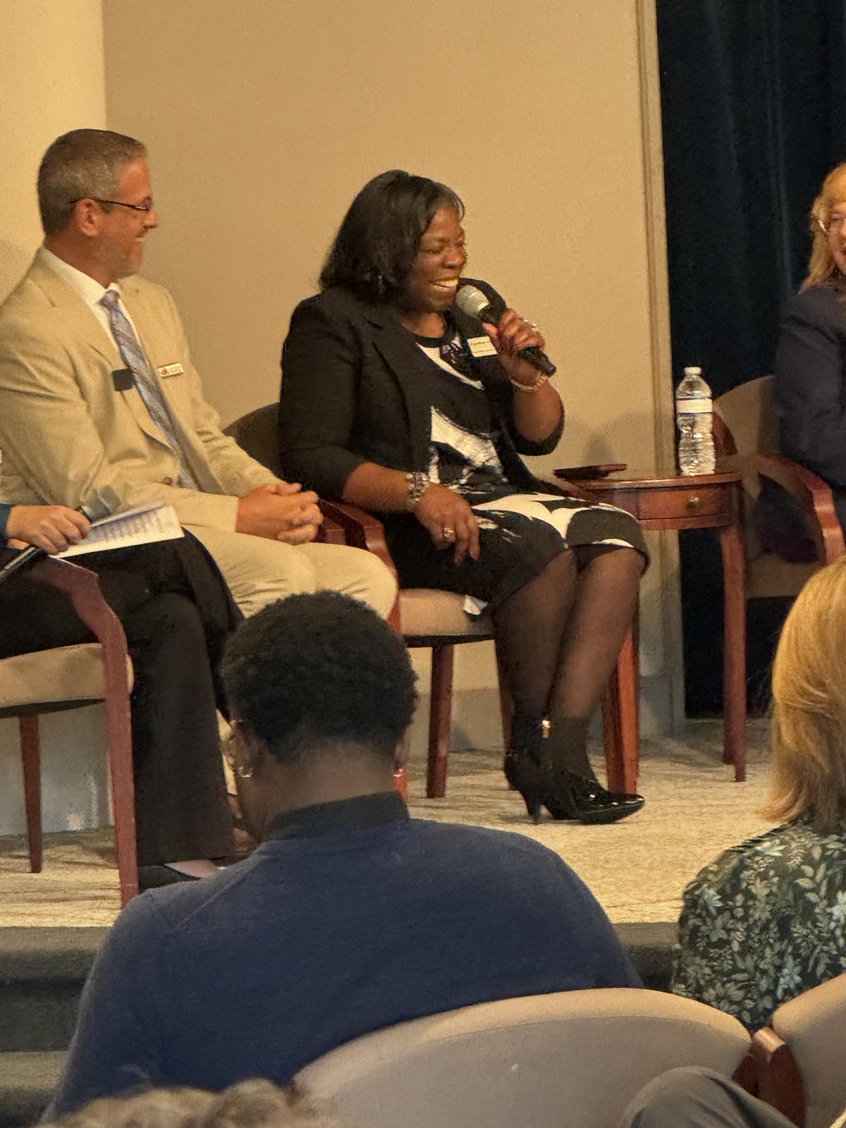 Cynthia Johnson in conversation with a community leader